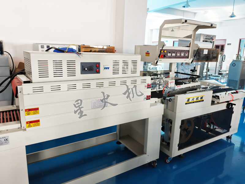 江蘇食品包裝機升級熱收縮包裝技術(shù)，給出休閑零食包裝新體驗